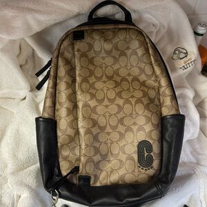 Coach backpack with charms